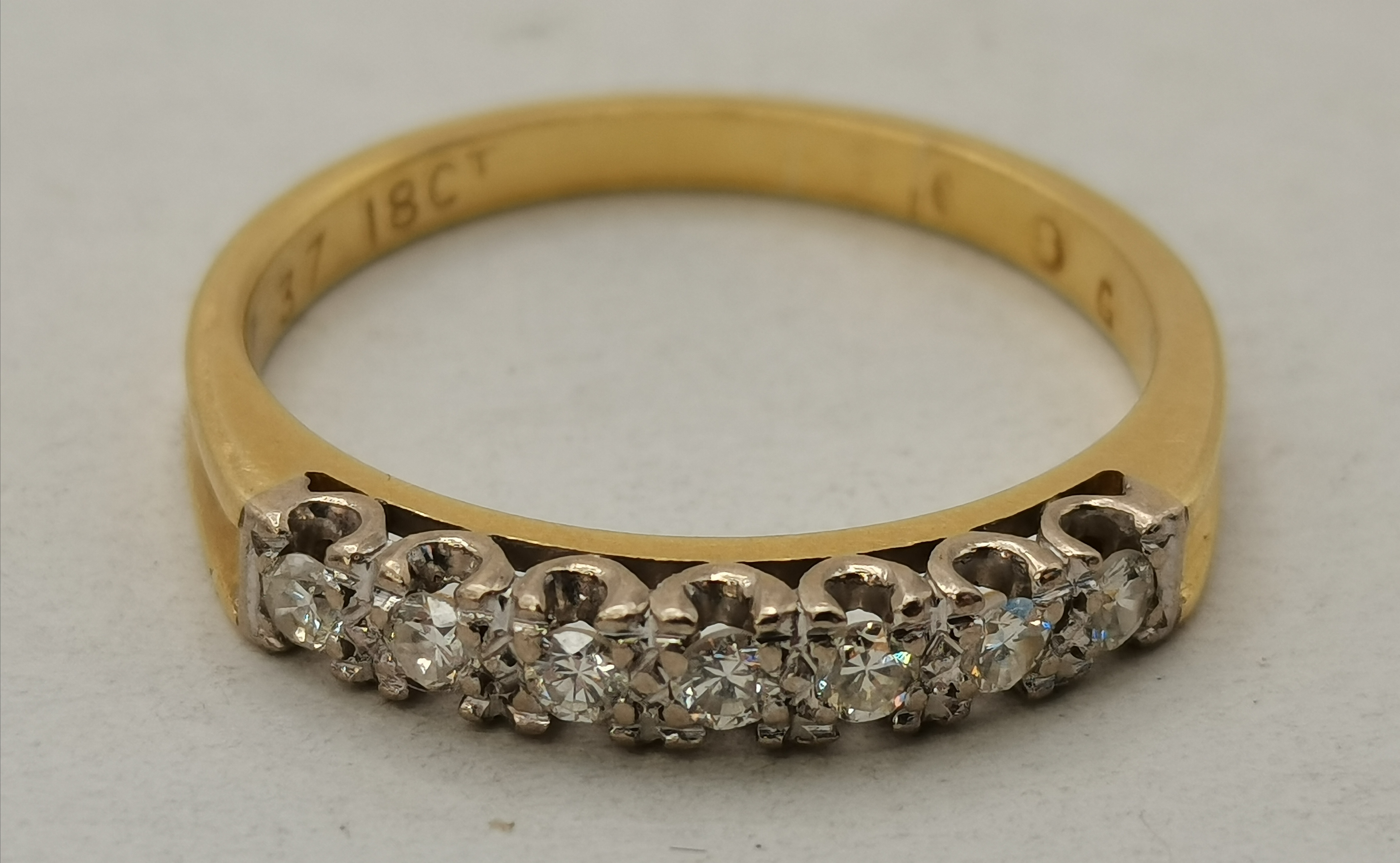 An 18 carat gold half hoop seven-stone ring - Image 2 of 3