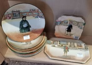 A collection of fourteen Royal Doulton Dickens Ware plates