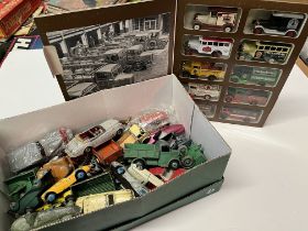 A collection of model vehicles, including Dinky and Timpo Toys