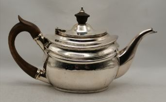 An Edwardian silver bachelor's teapot