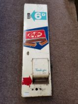 A vintage Kit Kat 6d vending machine