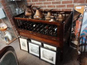 A 19th Century mahogany cot bed, with drop-hinged front - has been used as wine rack