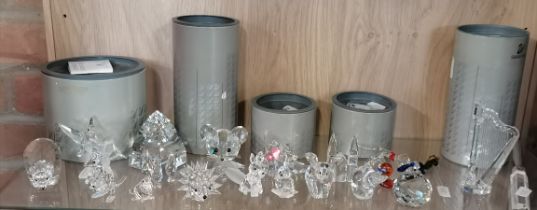 A collection of Swarovski and other crystal animal figures, etc.