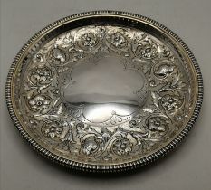 A Victorian silver-gilt alms dish