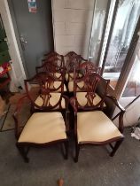 A set of 8 Strongbow mahogany dining chairs with prince of Wales decoration