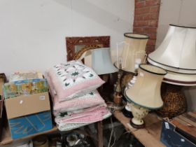 Old jigsaws, vintage style quilts, and a good selection of table lamps
