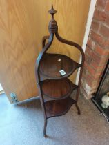 An Edwardian mahogany with inlay 3 tier circular c