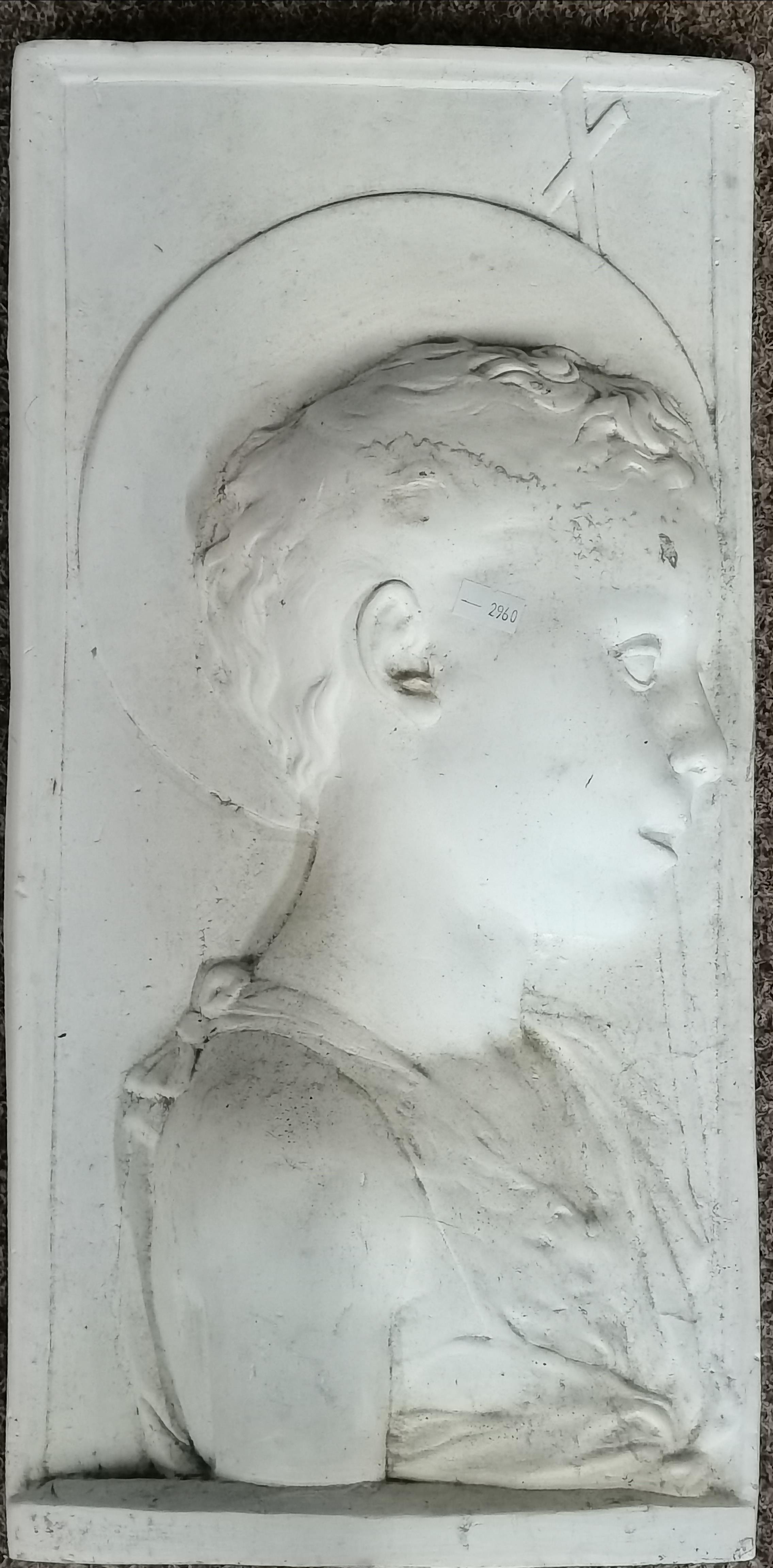 After Desiderio Da Settignano, 'Youthful St John the Baptist', a plaster plaque, 20th Century
