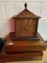 A 20th Century handmade wooden mantel clock