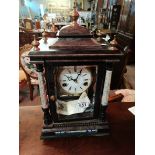 Knight brand mantle clock with highly decorative e