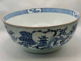 A large blue and white ceramic punch bowl, early 19th Century