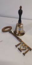Large vintage brass key and hand bell