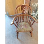 A Childs Windsor chair YEWOOD