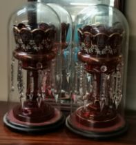 A Pair of Antique Victorian Ruby glass Lustres under glass domes