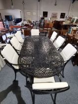 Bramblecrest Cast Aluminium in Black large oval garden table and 8 chairs with cream cushions