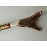 An antler handle walking thumb stick/staff