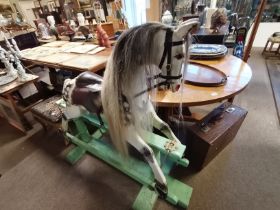 A large traditional wooden rocking horse, early/mid-20th Century