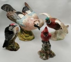 A group of four Beswick bird models