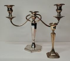 A George V silver candlestick, and a silver-plated three-light candelabrum