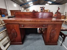 A Victorian mahogany chiffonier with two pillar cupboards