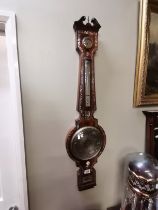 A Rosewood and mother of pearl decorated banjo bar