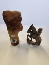 Carved animal head, possibly quartz plus stone figure