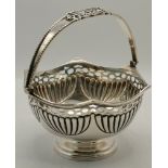 An Edwardian silver hexagonal swing-handle sugar basket