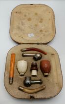 A late 19th/early 20th Century interchangeable smoking pipe set, cased