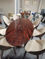 A KARPA Bonsai dining table K 1001 with resin base and oval sunburst walnut top