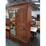 A Victorian satinwood double wardrobe