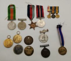 A miscellaneous group of assorted medals and tokens