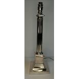 A silver-plated Doric column table lamp