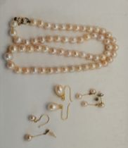 A suite of yellow metal-mounted cultured pearl jewellery