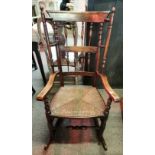 A reproduction of an early rocking chair with turn