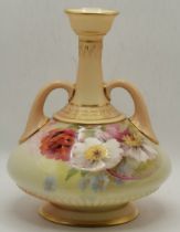 A Royal Worcester twin-handled floral decorated vase