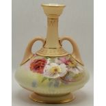 A Royal Worcester twin-handled floral decorated vase