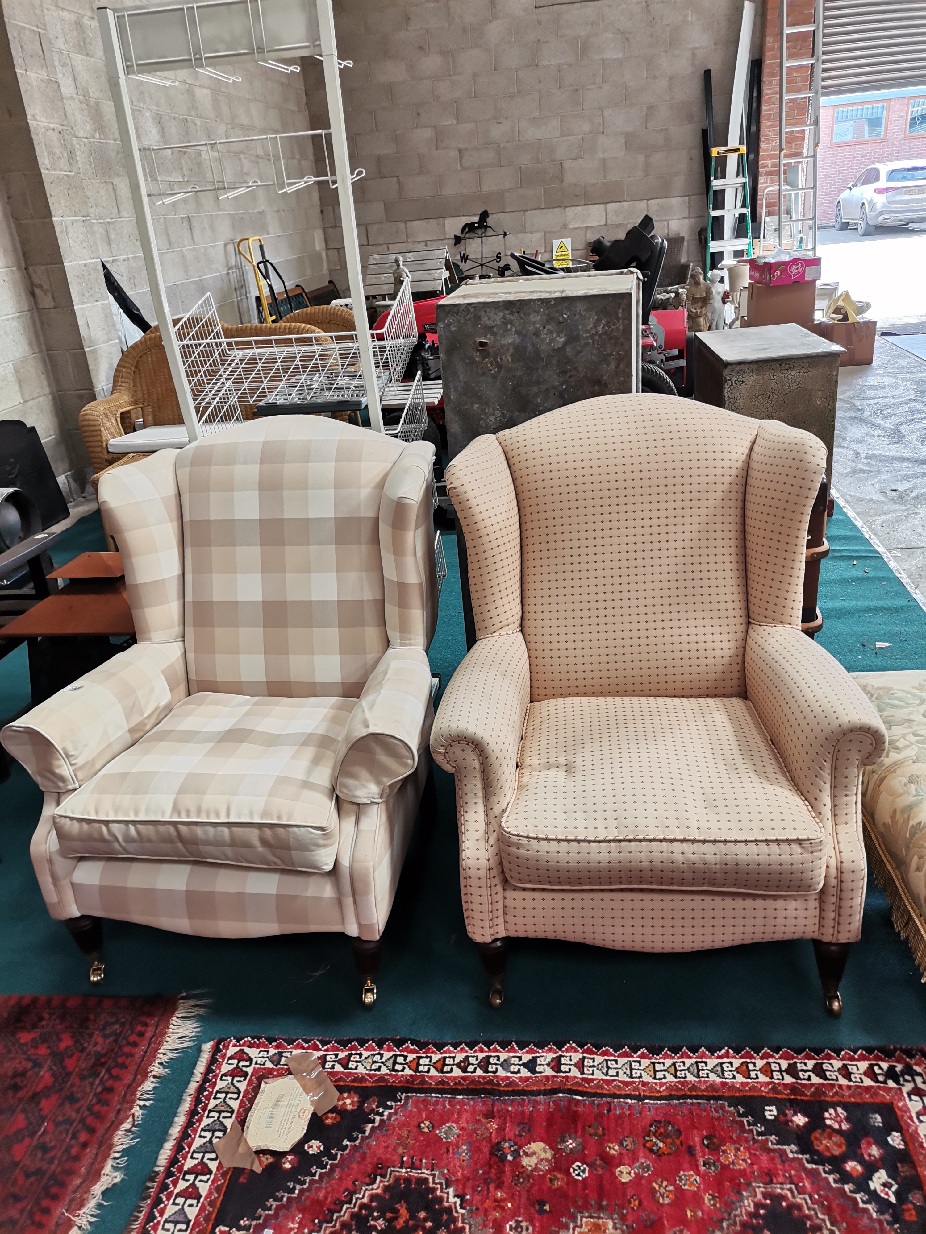 x2 Laura Ashley Wing back armchairs in cream on castors