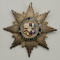 An Edwardian silver Ancient Order of Foresters breast star and pin badge