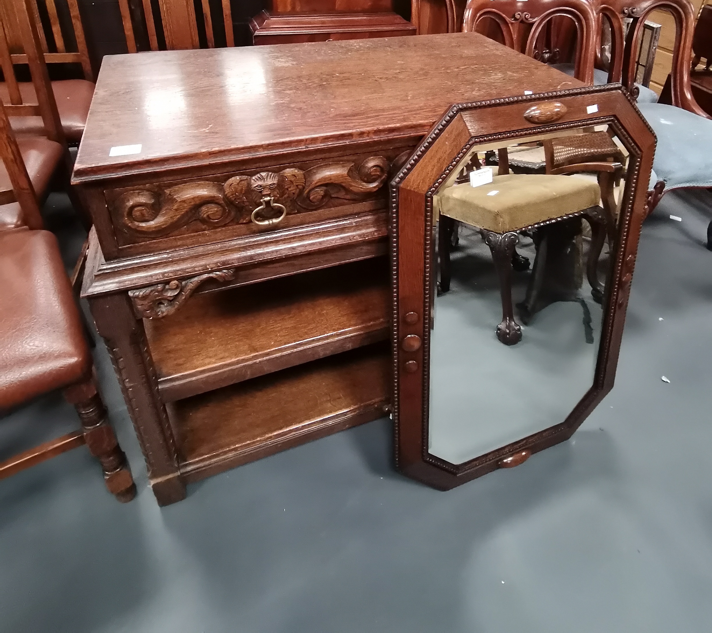 A good carved Japanese oak style serving table plus a matching wall mirror