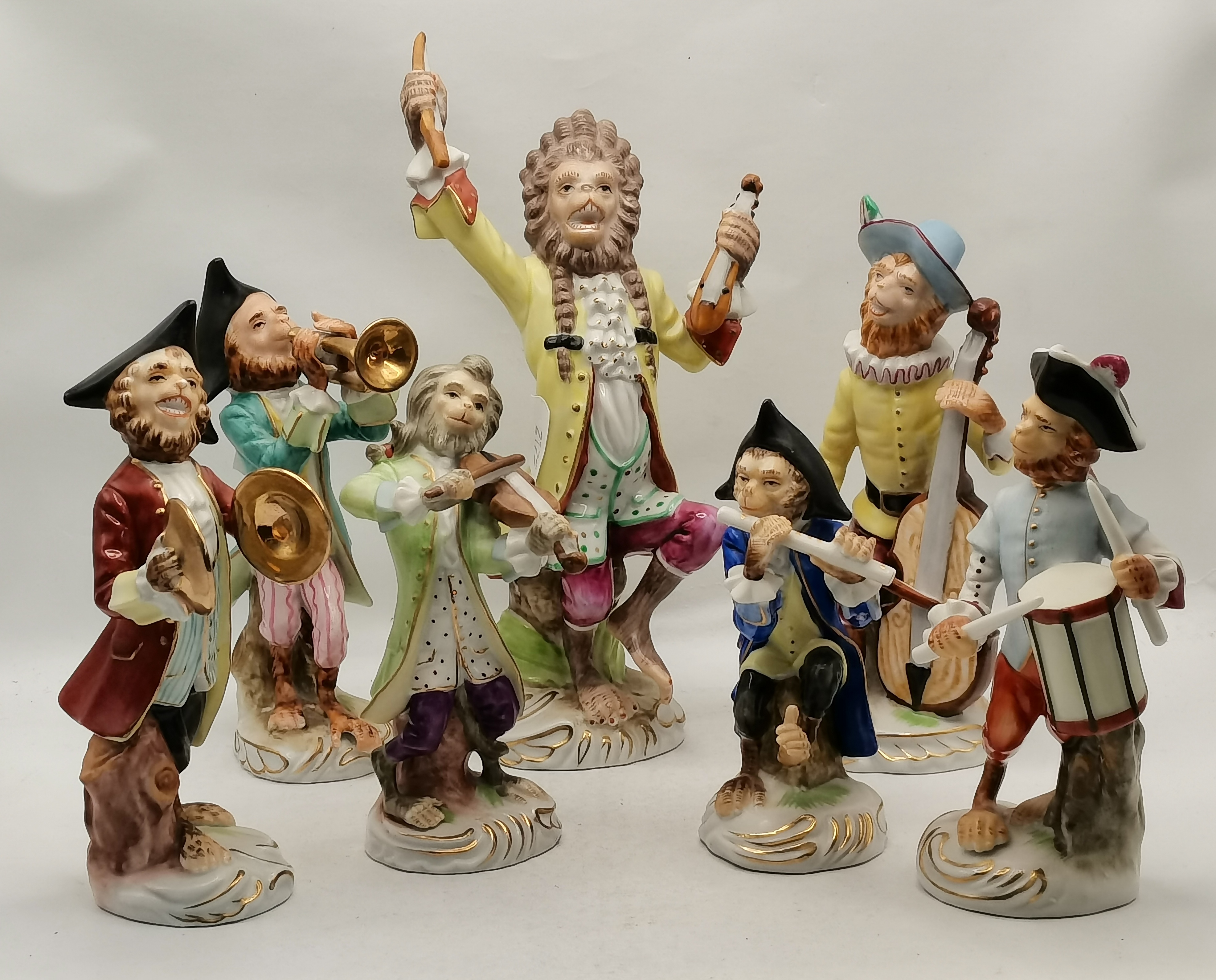 Seven porcelain monkey band figures, c.1950s