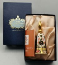 A Royal Crown Derby candle snuffer in original box