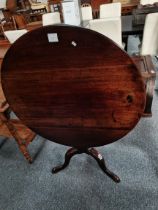 A Georgian mahogany tripod circular table