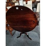 A Georgian mahogany tripod circular table