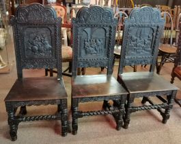 A set of 3 carved hall chairs