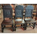 A set of 3 carved hall chairs