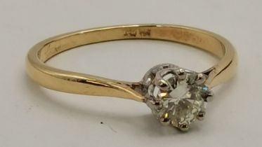 An 18 carat gold solitaire diamond ring