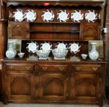An oak BEVAN AND FUNNELL dresser with plate rack