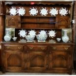 An oak BEVAN AND FUNNELL dresser with plate rack