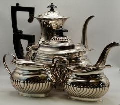 A silver-plated four-piece tea and coffee service