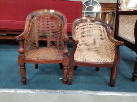 A Pair of Victorian Bergère cane childs chairs